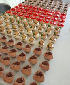 Beautiful, delicious and colourful mini dessert cups displayed for any event