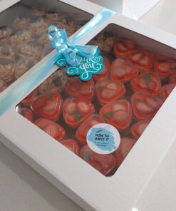 strawberry cheesecake, pineapple crush and oreo mini dessert cups packed in a box