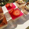 Beautiful and elegant mini cheesecake dessert cups. Flavours include strawberry, ferrero, passion fruit and lotus biscoff cheesecake